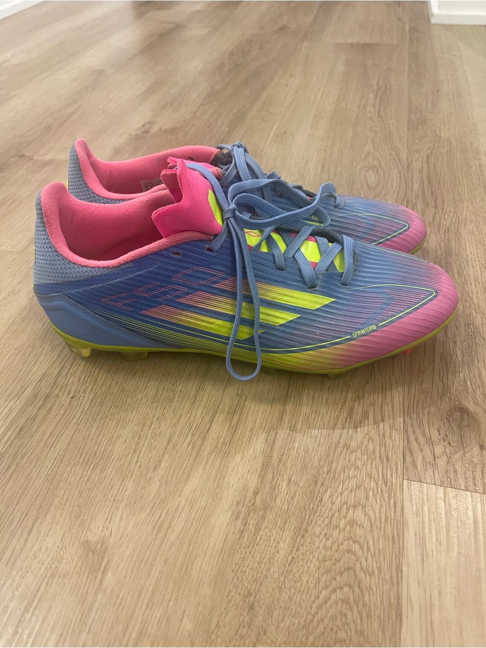 adidas Women's Blue-Pink Gradient Soccer Cleats with Neon Yellow Accents